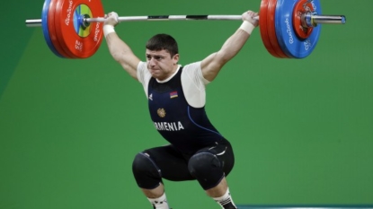 Armenian Weightlifter Suffers Shocking Elbow Injury During Summer Olympics Competition