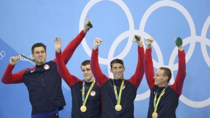 Michael Phelps, Katie Ledecky recreate autograph photo from 2006