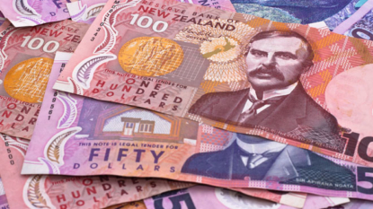 New Zealand cuts interest rates to record low