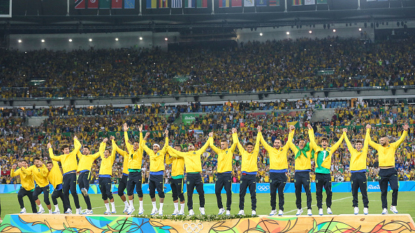 Neymar hands in the armband after captaining Brazil to Olympic gold