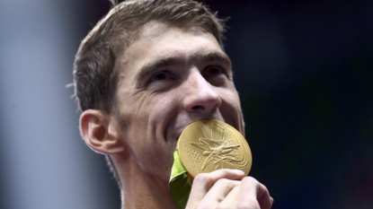 Phelps says he’ll immerse himself in fatherhood