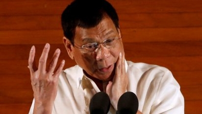 Philippine president acknowledges abuses in drug war