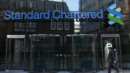 StanChart swings back to profit, shares rise 5 percent