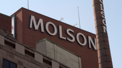 Molson Coors Q2 profit takes big hit