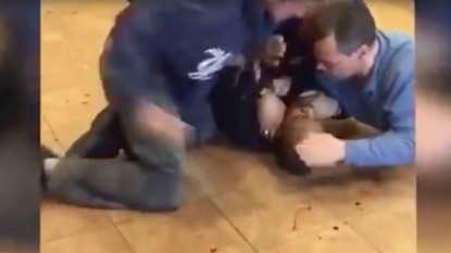 NYPD caught on video punching and kneeing black suspect in the head