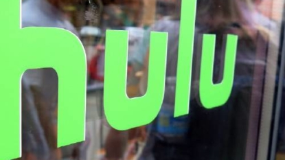 Time Warner 2Q profit tops Street; takes stake in Hulu