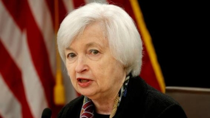 Slips in wake of comments by top Fed officials