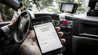 Uber to combine China business with Didi Chuxing in $35 billion merger