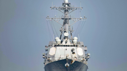 United States warship fires warning shots at Iranian boats