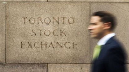 TSX up as banks, industrials gain; resource stocks weigh