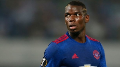 Scholes urges Pogba not to play like Messi