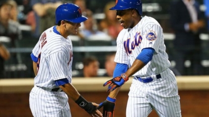 Robles, Conforto, Mets top Phils, stay atop wild-card race