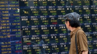 Asia stocks at one-year high as soft U.S