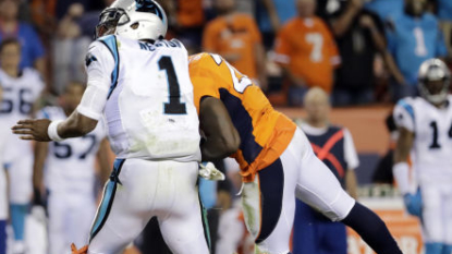 Broncos finally get to QB with punishing hits on Panthers QB