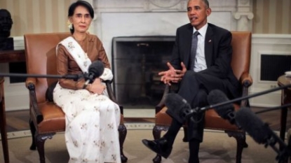 Obama vows to lift Myanmar sanctions as Suu Kyi visits