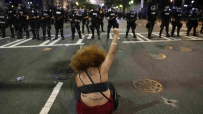 Charlotte protesters ignore curfew, hold peaceful demos