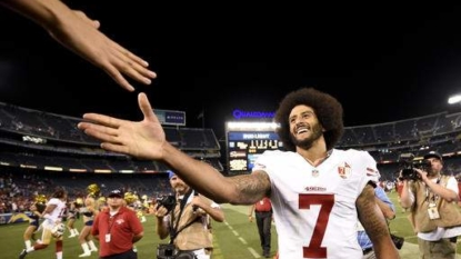 Colin Kaepernick Kneels During National Anthem, Continuing His Protest