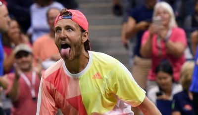 Nadal falls, Djokovic advances at US Open