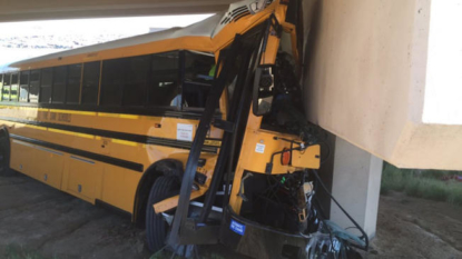 Driver killed after bus of high school football players, coaches crashes