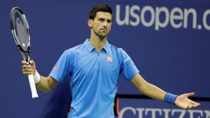 Despite elbow issue, Djokovic into US Open QFs