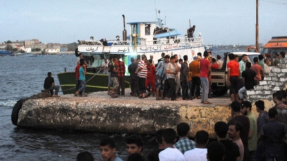 Four arrested over disaster that saw migrant boat carrying 600 sink