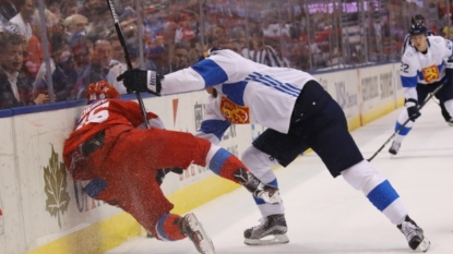 Canada wins World Cup group, draws either Russians or kids