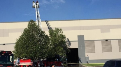 Firefighters investigate blaze at Gap Distribution Center