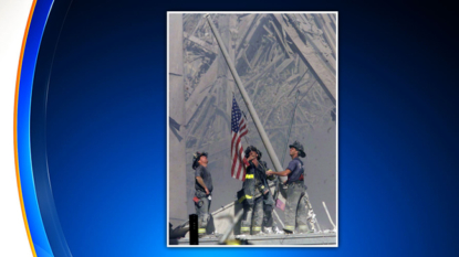 Flag firefighters raised at ground zero returns to site