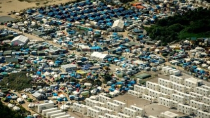 Calais migrant camp evacuation to continue, says Cazeneuve