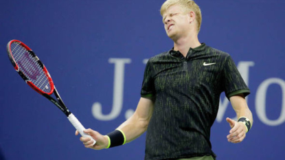 Edmund sets up showdown with Djokovic