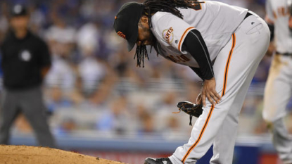 Giants remove Cueto from start with groin strain