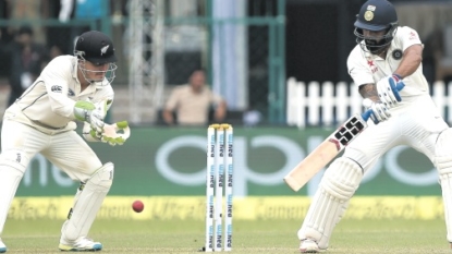 India collapse on day one as Black Caps fight back