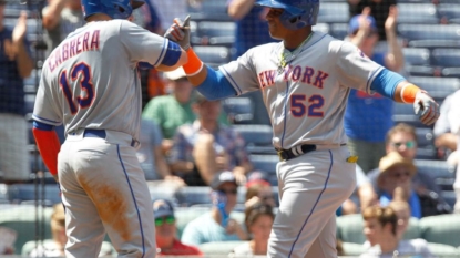 Johnson keys rally as Mets push run to 6