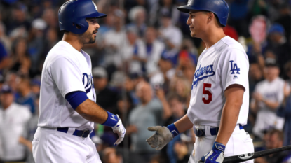 Grandal’s grand slam rallies Dodgers past Rockies 7-4