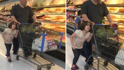 Furious woman confronts dad dragging daughter through Wal-Mart by her hair