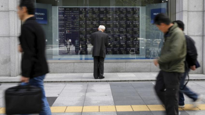 Asia stocks gain, dollar sags on Fed governor’s dovish comments