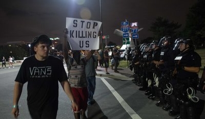 Suspect arrested in Charlotte protester’s death