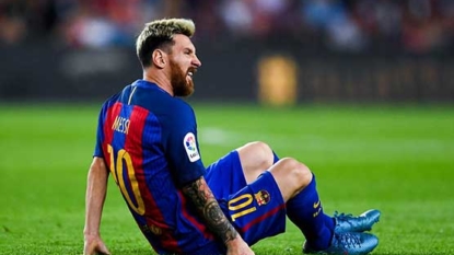 Messi hurts leg as Barca draws Atletico