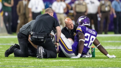 Mike Zimmer tells radio show that Peterson has torn meniscus