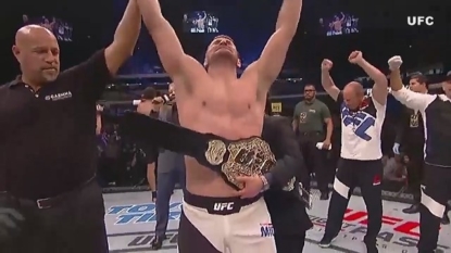 Stipe Miocic retains heavyweight title with TKO win over Alistair Overeem