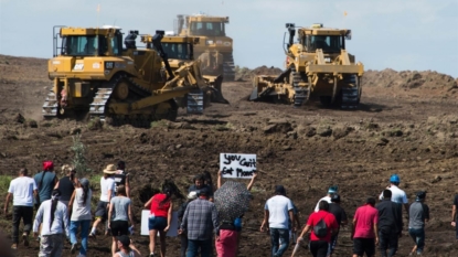 ND pipeline protesters, presidential candidate Stein spray-paint construction equipment