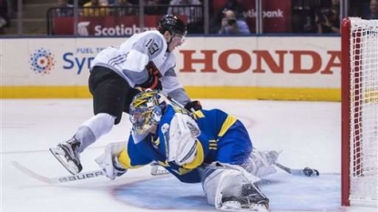 Nathan MacKinnon dekes out Henrik Lundqvist with World Cup goal