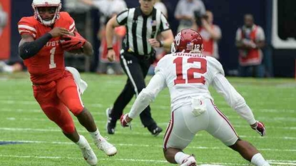 No. 1 Alabama rolls Kent State 48-0, loses Harris to injury