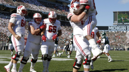 No. 11 Badgers rip No. 8 Spartans 30