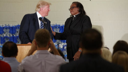 Pastor stops Donald Trump as he berates Hillary Clinton in black church