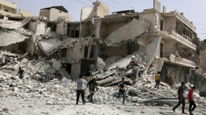 Syrian air strikes kill at least 90