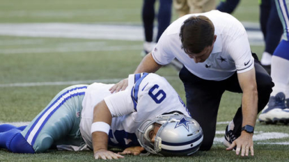 Tony Romo suffers broken bone in back, might miss 6-10 weeks