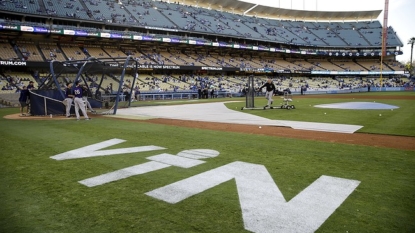 Rockies crumble again in 5-2 loss to 1st place Dodgers