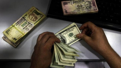 Rupee softens 12 paise against dollar in early trade