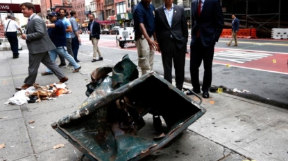 Search for men who took bomb from NY suitcase